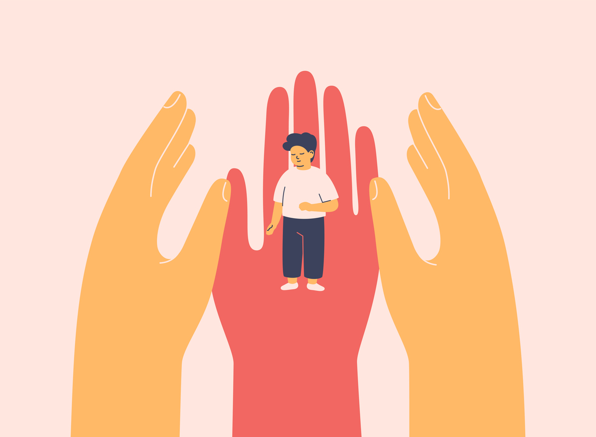 Three human hands surrounding a small boy, indicating adult care for children.